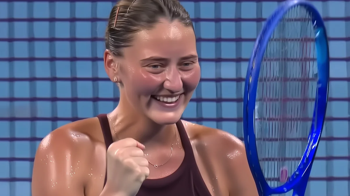 Marta Kostyuk celebrates with a clenched fist and wide smile after reaching the semifinals at the 2026 Brisbane International.