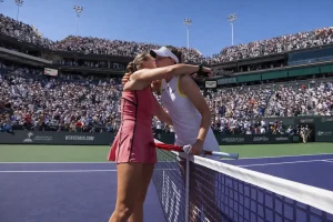 Elena Rybakina congratulates Aryna Sabalenka at the net after the Indian Wells 2026 final in front of a packed stadium crowd.