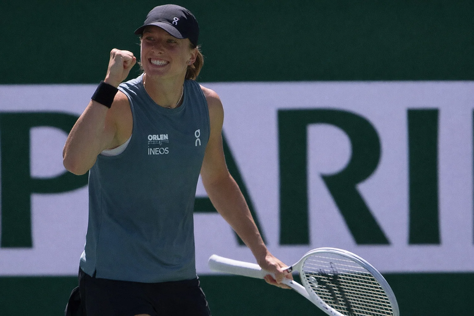 Iga Swiatek celebrates a point during the 2026 Sunshine Double on a hard court tennis match