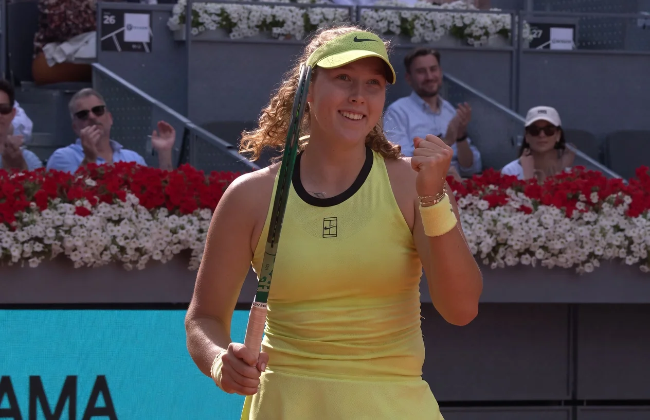 Mirra Andreeva smiling and pumping her fist after reaching the 2026 WTA Madrid Open Final on clay