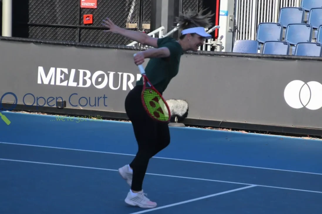 Gabriela Dabrowski practices on court during a training session in Melbourne, working on her movement and footwork