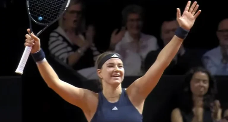 Karolína Muchová celebrates with raised arms after reaching the final at the Stuttgart 2026 tournament.