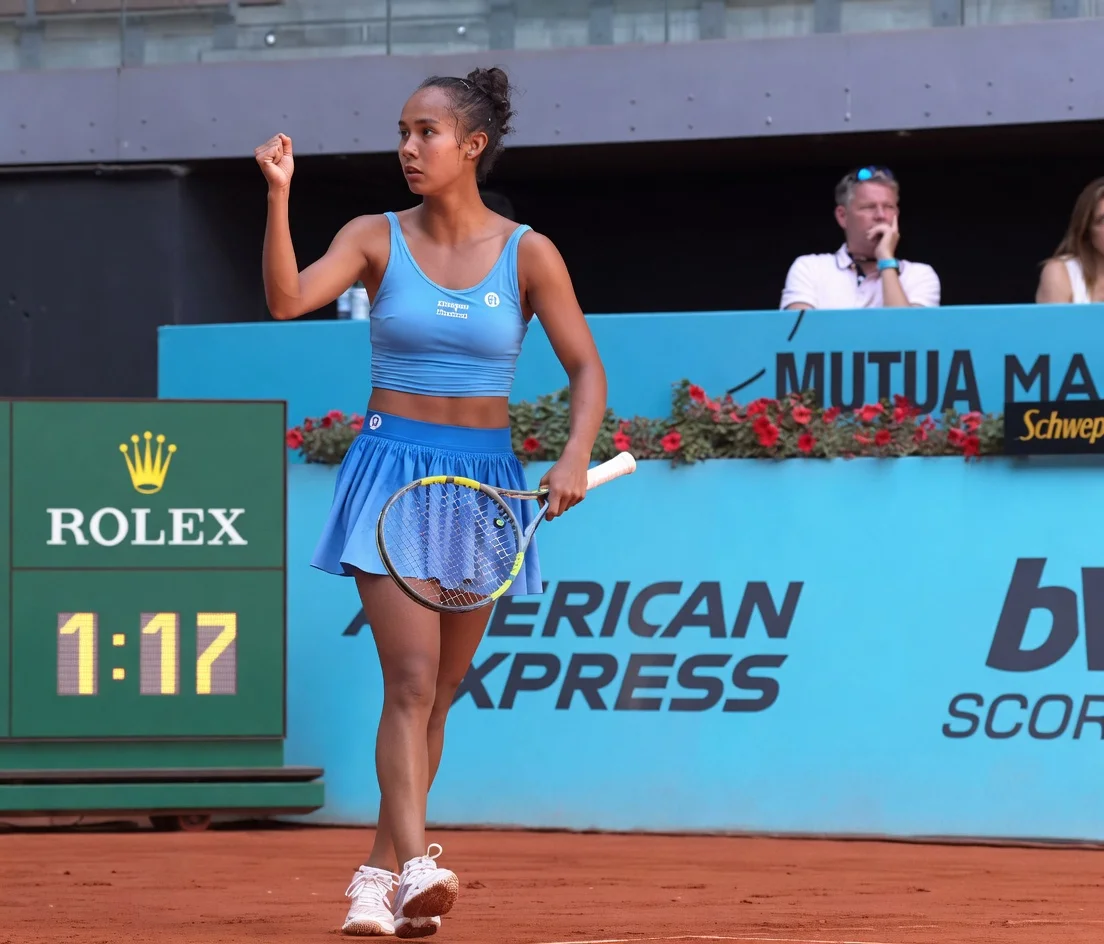 Leylah Fernandez fist-pumping after a point during her fourth-round match at the 2026 Madrid Open on clay