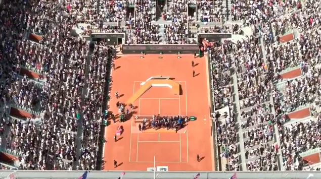 Both women’s 2026 French Open finalists await the trophy ceremony.