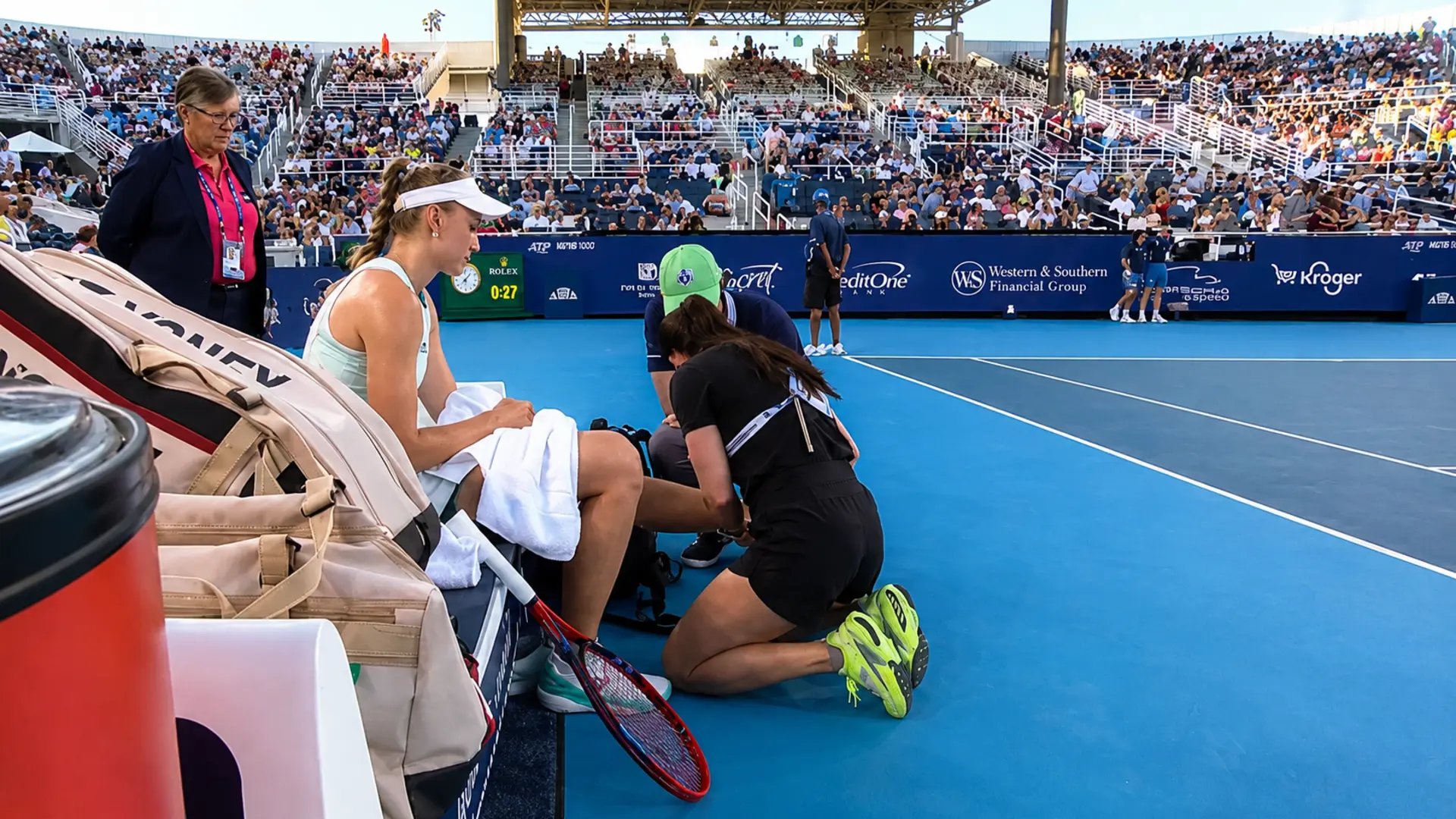 Elena Rybakina receives treatment during her quarterfinal match against Iga Swiatek at the Cincinnati Open