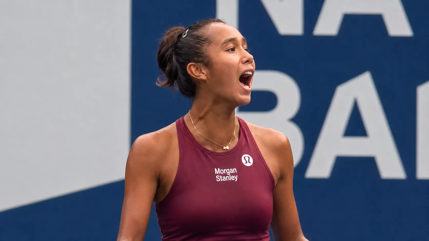 Leylah Fernandez celebrates after defeating Mirra Andreeva in the Round of 32 in Toronto