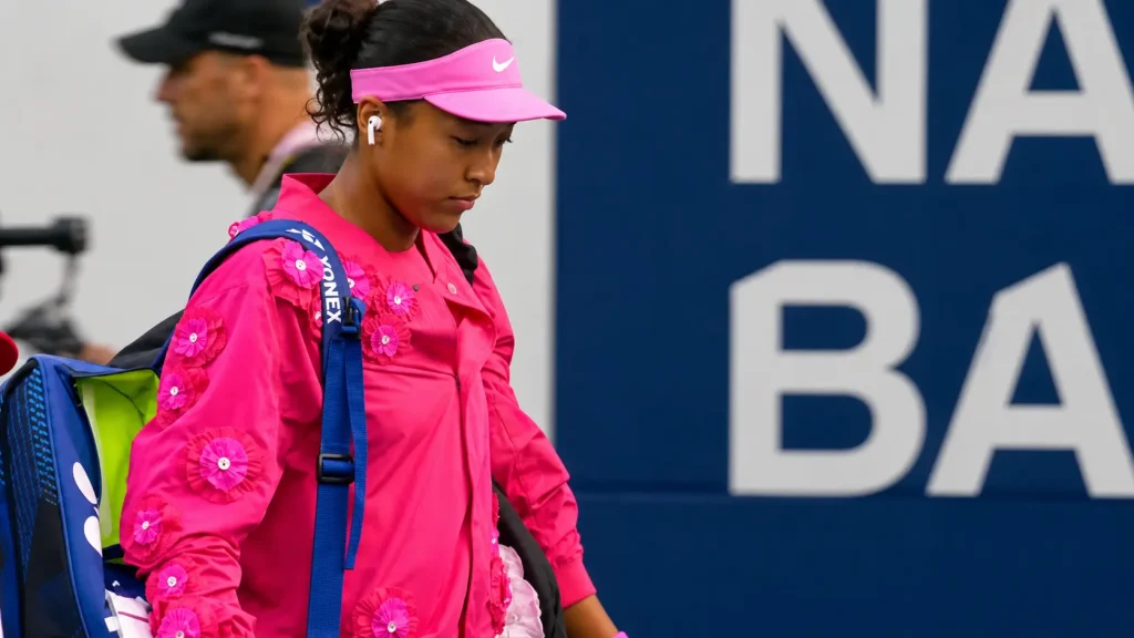 Naomi Osaka enters the Toronto arena ahead of her match at the Canadian Open