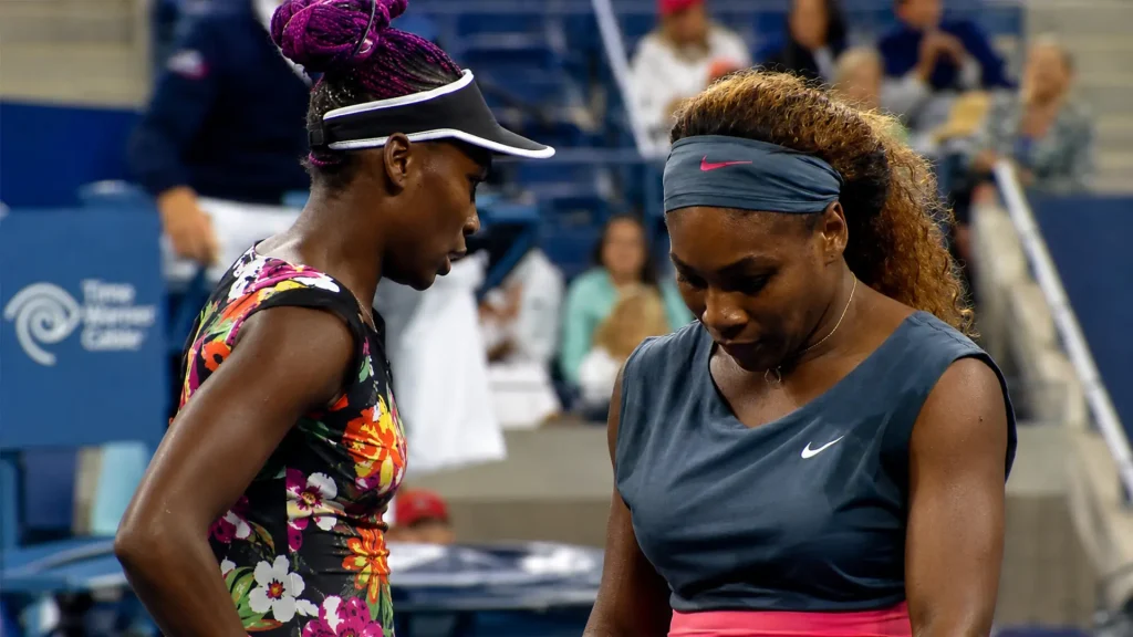 Serena Williams and Venus Williams compete together in women’s doubles
