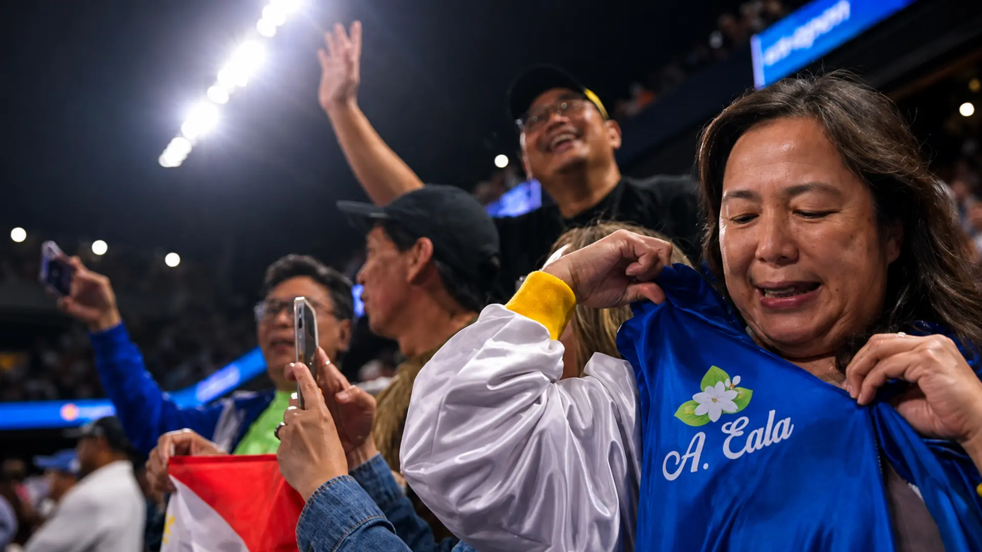 Filipino fans celebrate Alexandra Eala’s victory inside Louis Armstrong Stadium at the 2026 US Open
