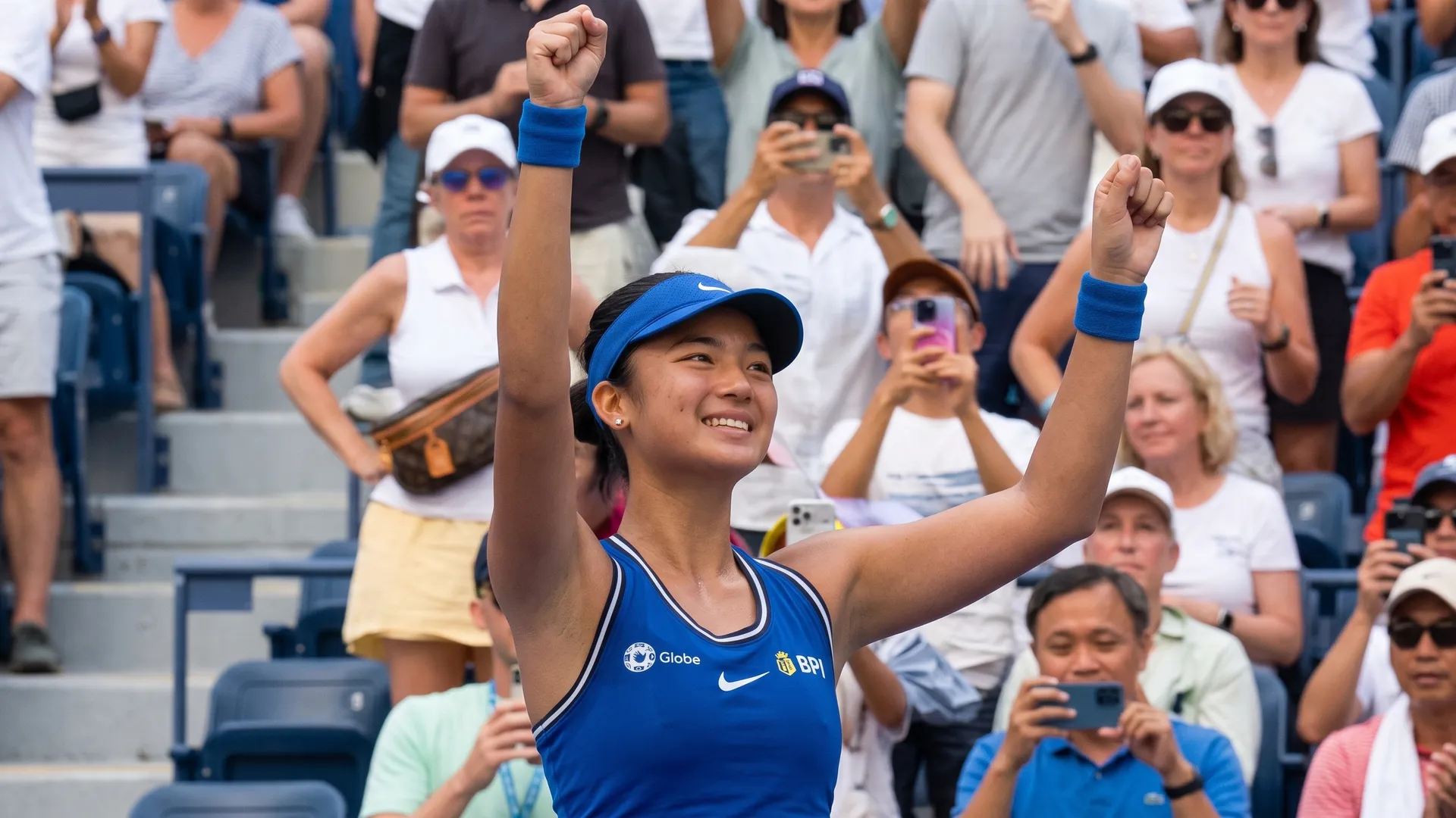 Alexandra Eala celebrates on court during the 2026 US Open at Flushing Meadows