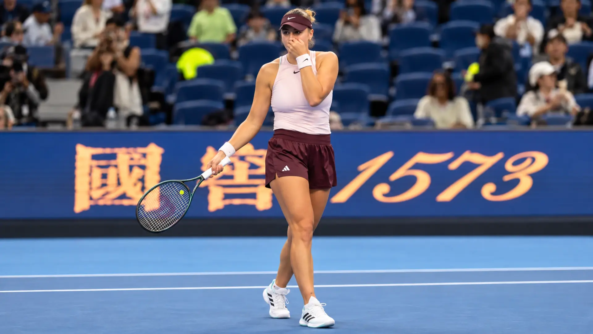 Alina Charaeva reacts after stunning Elena Rybakina in the second round of the 2026 China Open in Beijing