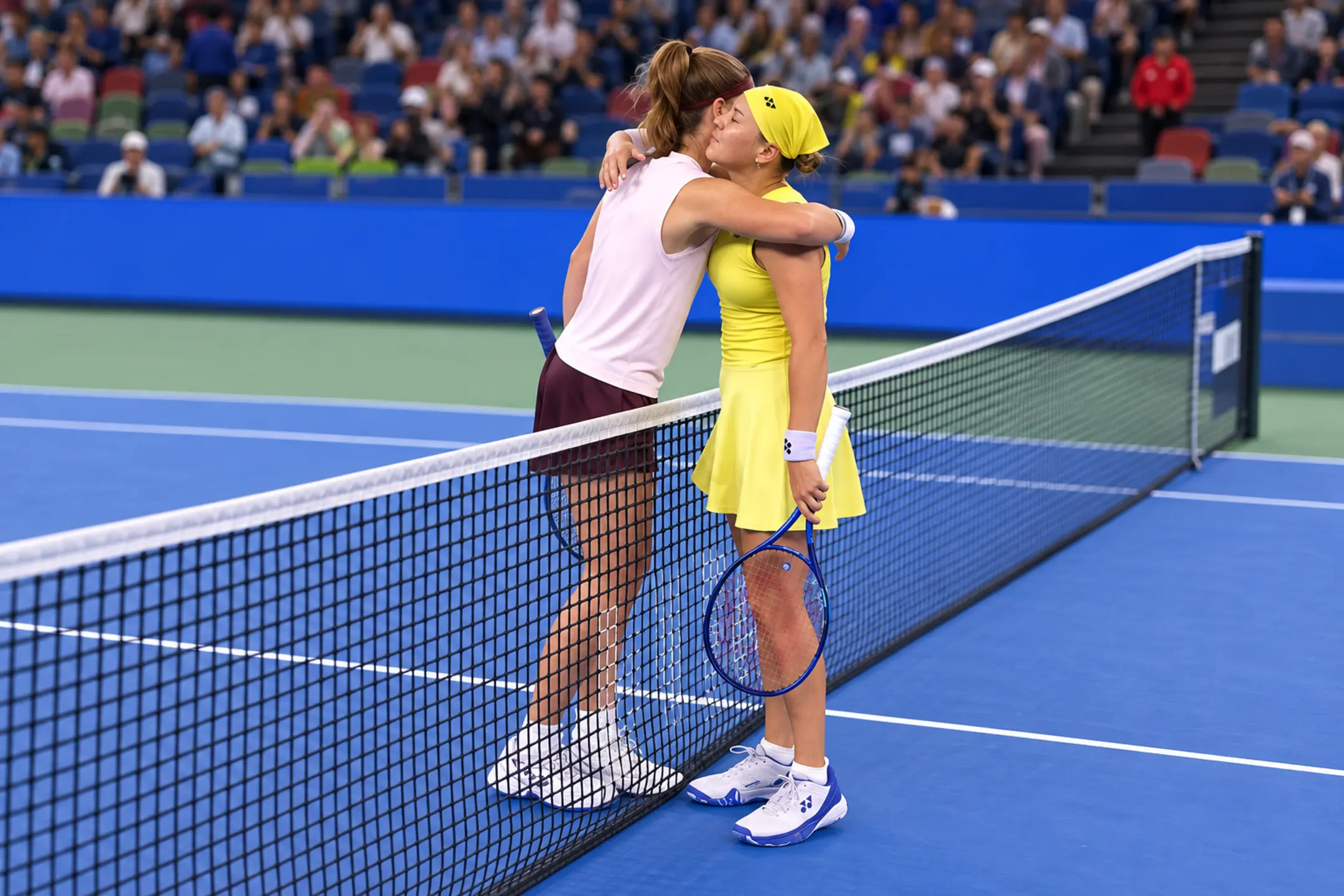 Karolina Muchova congratulates Diana Shnaider after her victory at the 2026 Wuhan Open
