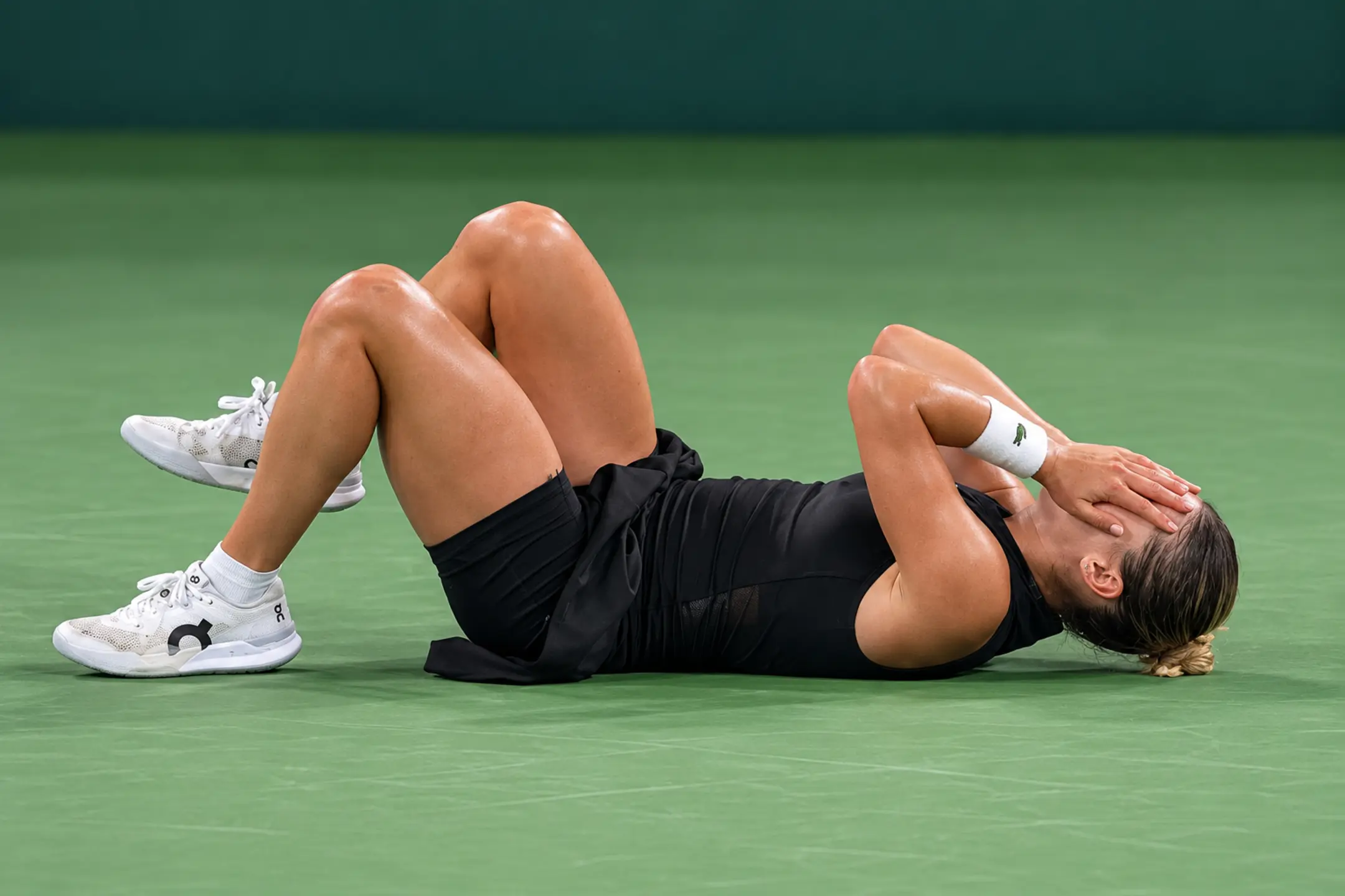 Maja Chwalinska lies on court in disbelief after winning her first WTA career title at the 2026 Wuhan Open