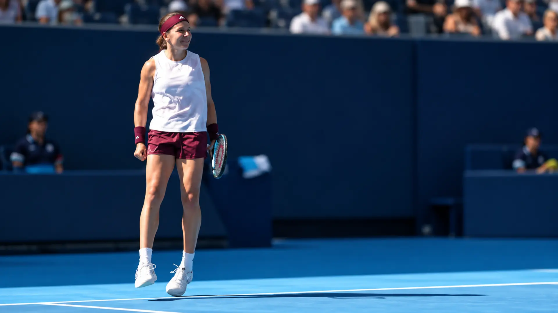 Nikola Bartunkova jumps in celebration after defeating Aryna Sabalenka at the 2026 China Open