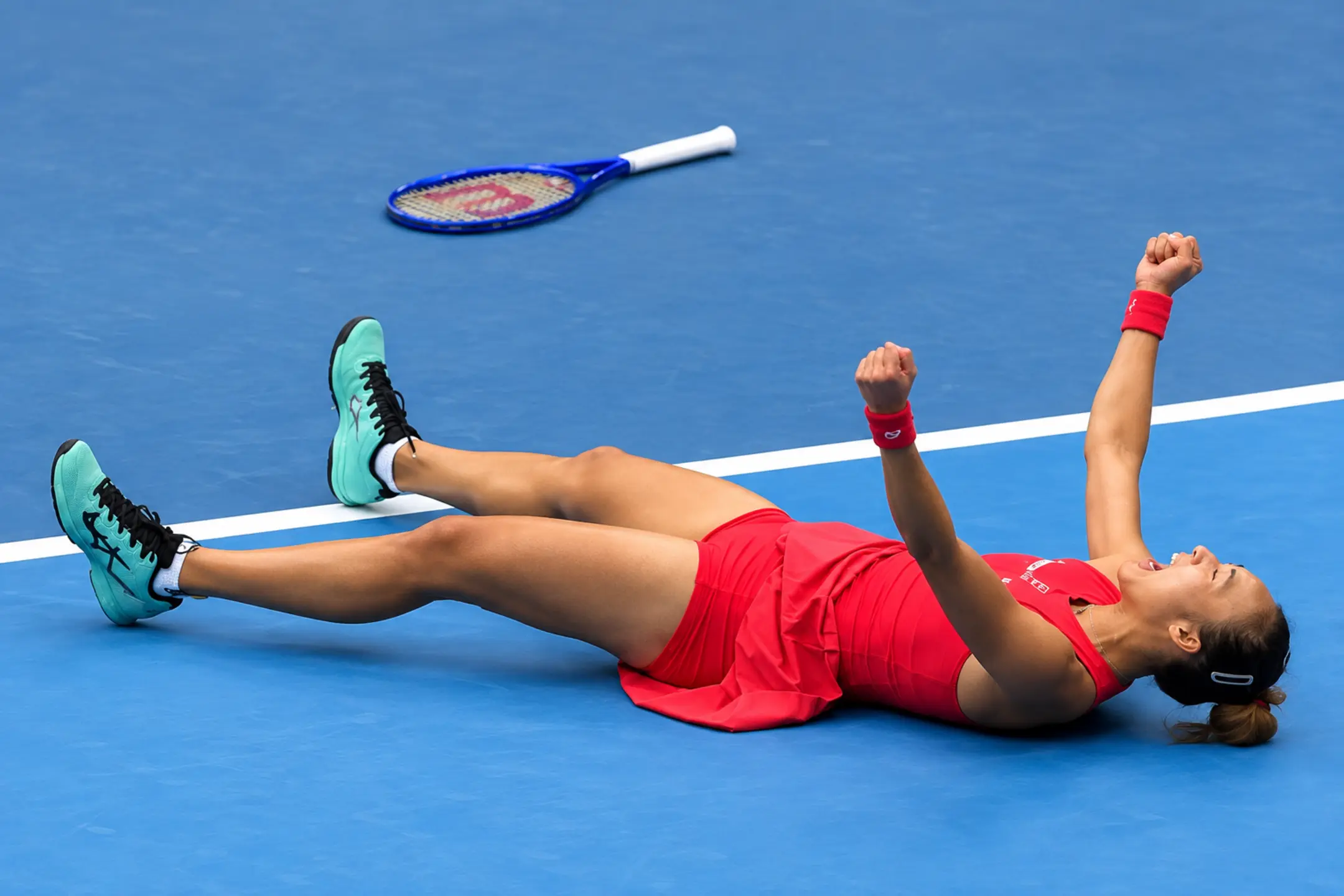 Qinwen Zheng celebrates after reaching the semifinals of the 2026 China Open in Beijing